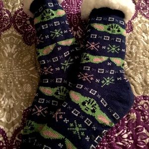 Disney’s “The Child” fluffy socks (L)